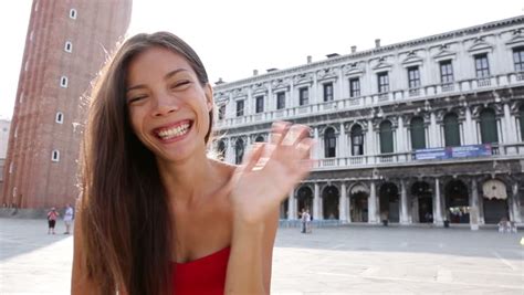 Woman Waving Hands Saying Hello In Venice Smiling Happy Cheerful