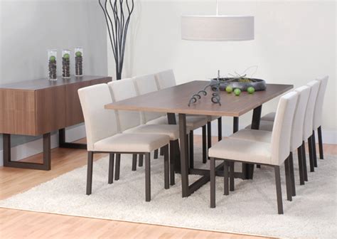 Position this sturdy end table next to a sofa or chair with its back metal. Modern Wood Top Dining Table with Metal Base - dining tables