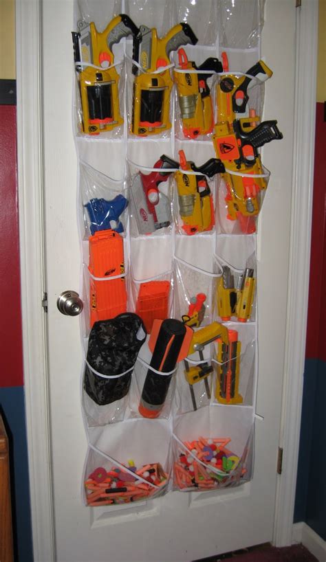 Used various hooks, wood screws, and nails to mount the guns. Moore Magnets: Shoe Racks as Toy Storage