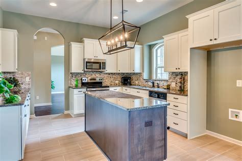 Beautiful Open Concept Kitchen With Stainless Steel Appliances Granite
