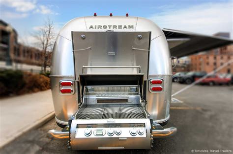 Tailgating Airstream By Timeless Travel Trailers Featuring A Roll Out