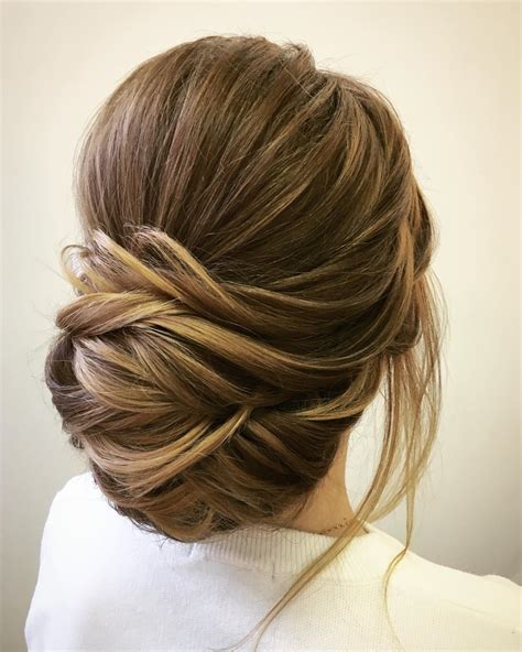 10 chignon buns for every occasion new season s best buns pop haircuts