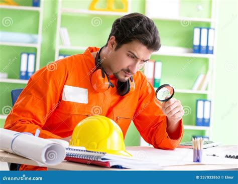 Construction Supervisor Planning New Project In Office Stock Image
