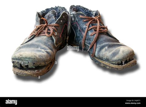 Isolated Pair Of Dirty Boots Old Worn Dark Blue Leather Shoes With