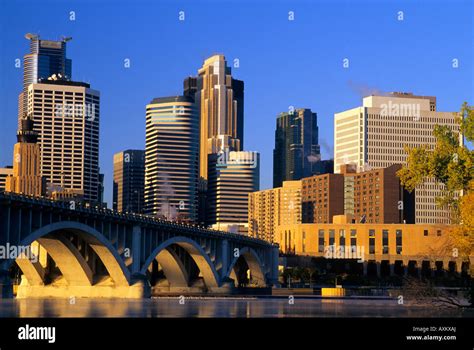 Skyline Of Minneapolis Minnesota And Third Avenue Bridge Over The