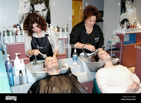 Woman Has Hair Cut Shampoo Color And Permanent Done By A Beautician At