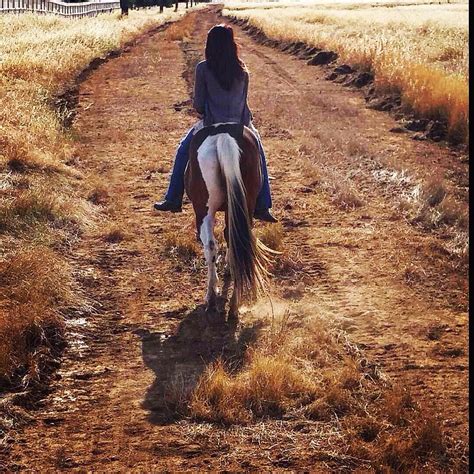 The Cowgirl Rides Away Photograph By Jenna Combs Pixels