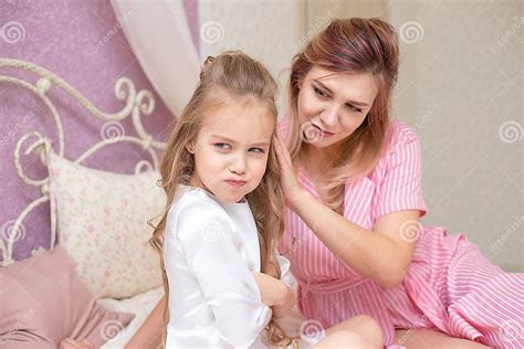 Loving Mother Consoling Her Sad And Sulky Daughter Stock Image Image
