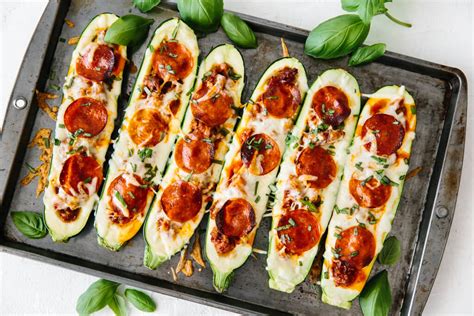 These stuffed zucchini boats are easy to make but take just a little bit of time. Pizza Stuffed Zucchini Boats | Downshiftology