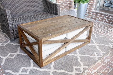 Perfectly designed to complement any outdoor seating arrangement, our coffee table features a sturdy metal frame with a rich wood tabletop that rounds out your decor. DIY outdoor coffee table | with storage - Crazy Wonderful