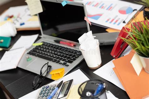 Messy And Cluttered Desk Stock Image Image Of Document 189076759