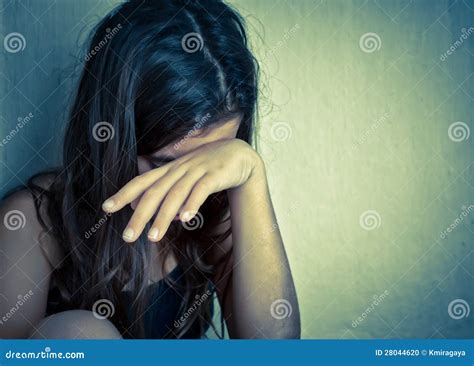 Lonely Girl Crying With A Hand Covering Her Face Stock Photo Image