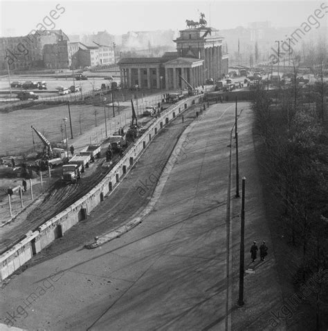 When the berlin wall went up in 1961, the gate stood in an exclusion zone in an arc of the wall, inaccessible for locals and visitors alike. akg-images - The Reichstag / Berlin Wall / 1961The Berlin ...