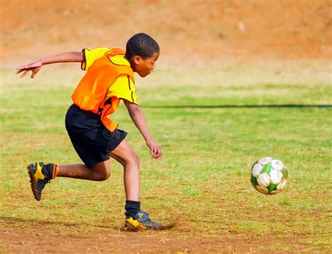 Diverse Children Playing Soccer Football At School Editorial Photo