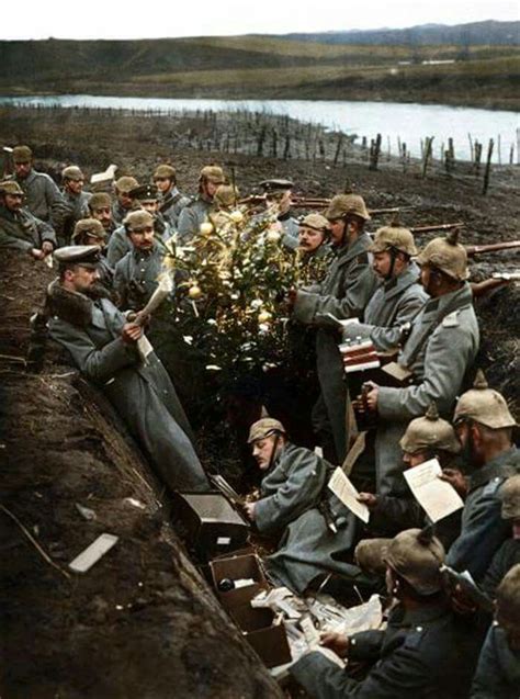 German Troops Singing Around A Christmas Tree In Their Trench On The