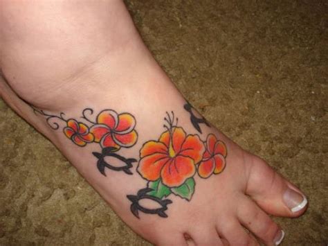 Great Orange Hawaiian Flowers Tattoo On Foot Tattooimages Biz
