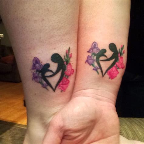 My Mother Daughter Tattoo With My Mom Purple Flowers Are The February Birth Flowers And The