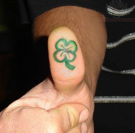 Thumb Tattoo Images And Designs