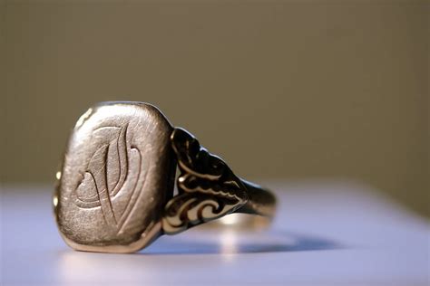 Your Guide To Wearing Signet Rings 2024