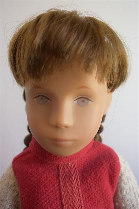 sasha doll pale colors annika pink lips brunette german braids edition dolls