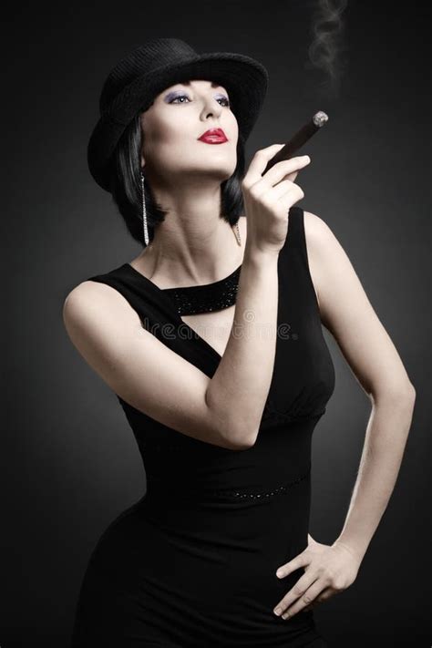 A Vintage Woman Smoking A Cigar Stock Images Image 16136914