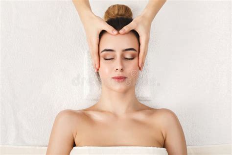 Woman Getting Professional Facial Massage At Spa Stock Image Image Of Massage Client 114148101