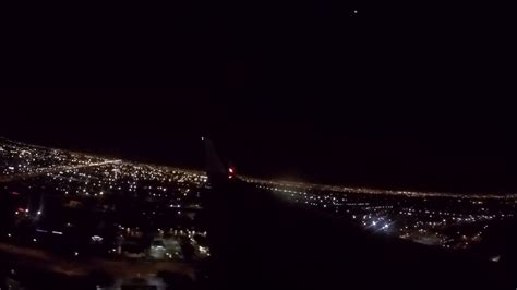Night Time Landing At Miami International Airport On American Airlines