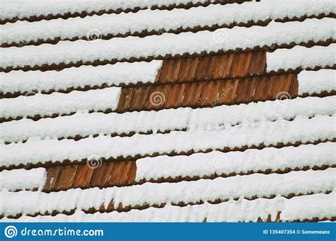 The Roof Of Clay Tiles Covered With Snow Texture Stock Photo Image