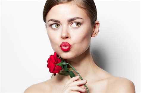 Premium Photo Woman With A Rose In Her Hands Red Lips Kissing Naked