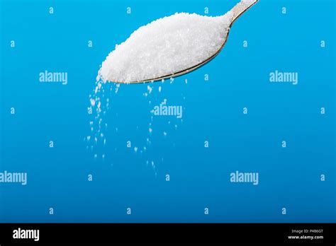 Pouring Sugar On A Pile Of Sugar Stock Photo Alamy