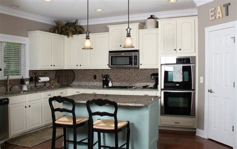 After removing the hardware, we recommend that the cabinets be thoroughly cleaned with a good cleaner degreaser to remove all grease and oils that normally buildup on kitchen cabinetry over time. Annie Sloan Duck Egg Blue Painted Kitchen Cabinets