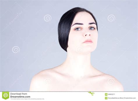 Beautiful Woman With Black Hair And Gray Eyes Looking Proud Glance