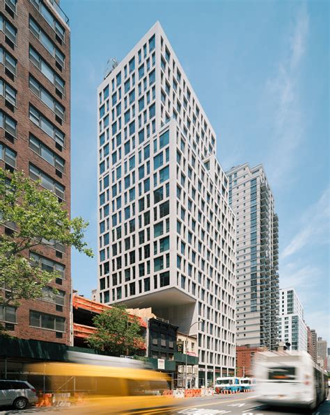 Luxury Manhattan Apartment Tower By S9 Architecture Cantilevers Over Low Rise Neighbour