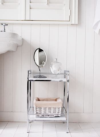 Open shelving is now being integrated into bathroom designs as another architectural element lacava, for example, offers a wall mounted corner shelf with polished chrome bracket that's dipped. White Gloss and Chrome small bathroom shlelf for small spaces