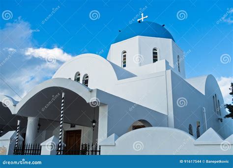 White Church With Blue Dome At Oia Village Santorini Island Stock