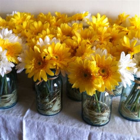 Blue Mason Jars With Raffia And White And Yellow Daisiesour Wedding
