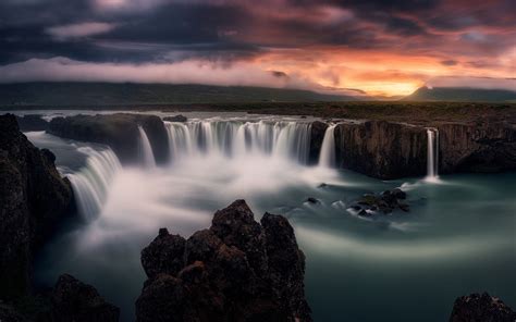 Sunset Over Waterfall Hd Wallpaper Background Image