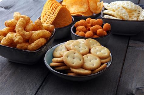 Salty Snacks Pretzels Chips Crackers In Bowls Stock Image Image
