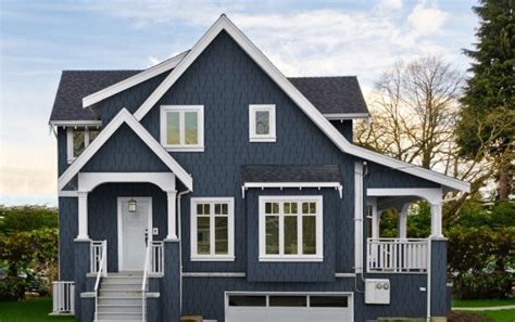 Almost any color house will look decent with a black color shingle. Home Color Options: Blue House Siding with White Trim in ...