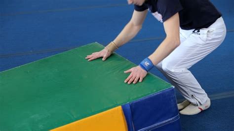 How To Do A Forward Straddle Roll Gymnastics Lessons Gymnastics
