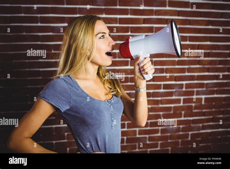 Woman Yelling Through Megaphone Stock Photo Alamy