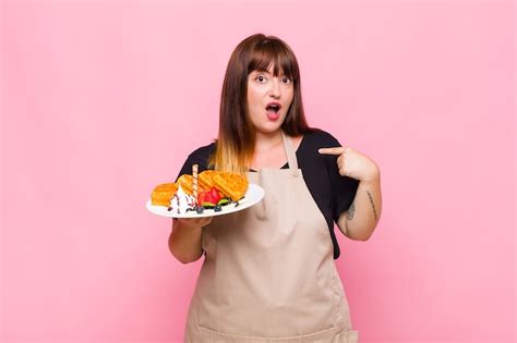 Premium Photo Plus Size Woman Looking Shocked And Surprised With Mouth Wide Open Pointing To Self