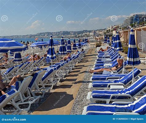 Blue Umbrellas On The Beach At Nice France Editorial Stock Image
