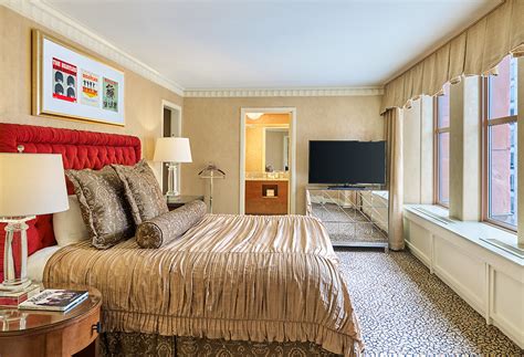 This is another example of a beatles inspired bedroom with more minimalist setting, but the epic cover of abbey road used as a focal point artwork above the bed is a smart and genius move. Beatles Suite - The Brown Palace Hotel