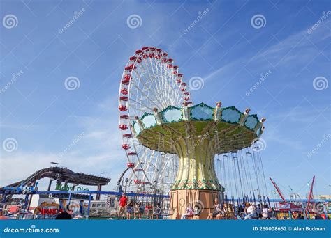 Amusements Including Ferris Wheel And Swing Roundup On The Ocean City