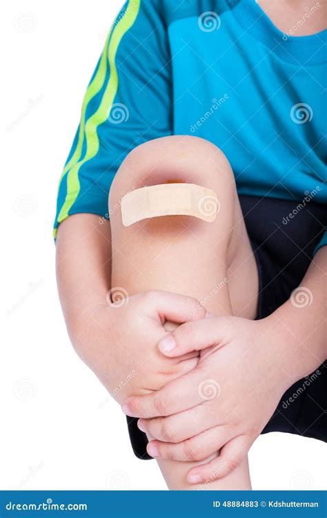 Child Knee With A Plaster For Wounds And Bruise Stock Photo Image