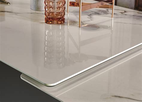 Legs and rails have polished chrome finish. Go Modern Ltd > Extending Dining Tables > Bonaldo Ax ...