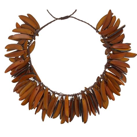 Elle fait directement fabriquer ses modèles originaux en. Collier Flamme en Tagua - Classics
