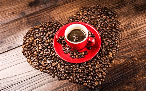 coffee beans grains heart shaped red cup red ceramic round plate cup coffee bean lot