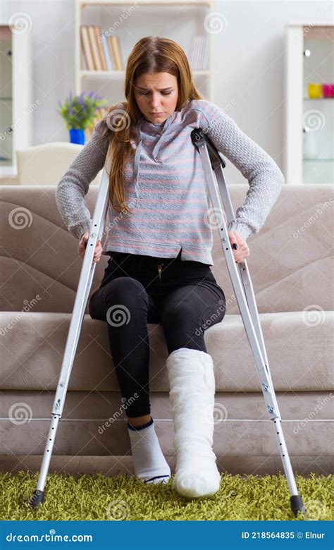 Young Woman With Broken Leg At Home Stock Image Image Of Crutch